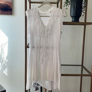 Lightweight lined summer dress.  37 1/4 “ in Length in the back.  32 1/2”  front